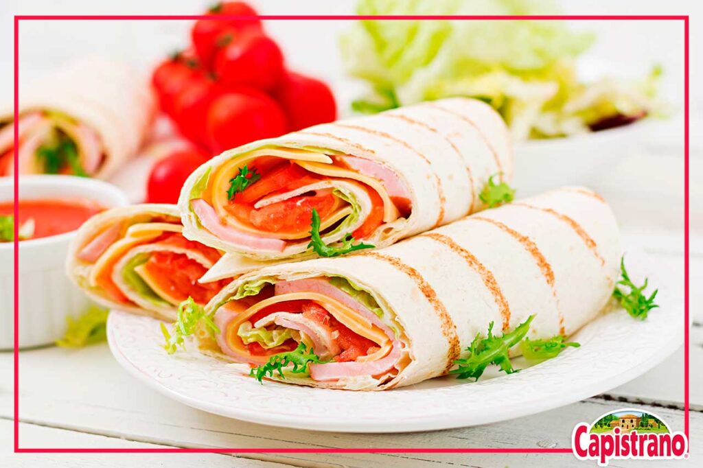 En esta ocasión te enseñaremos hacer un wrap con tortilla de avena relleno de verduras y jamón de Capistrano.