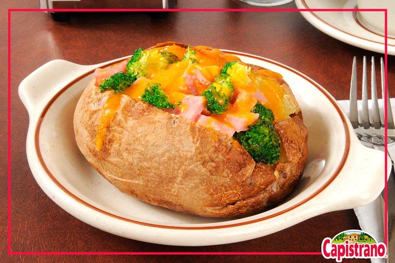 How about a Delicious potato stuffed with ham, broccoli and cheese to pamper her in her day ?